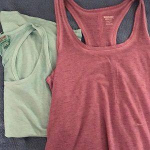 Two razor back target tank tops